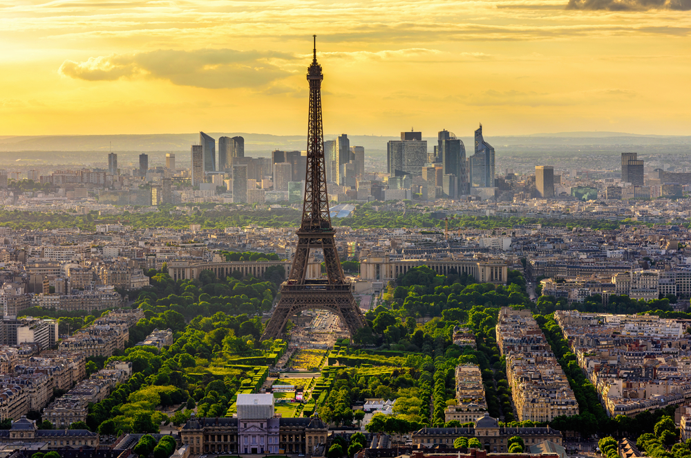 Skyline of Paris with Eiffel Tower at sunset in Paris, France. Eiffel Tower is one of the most iconic landmarks of Paris. Postcard of Paris