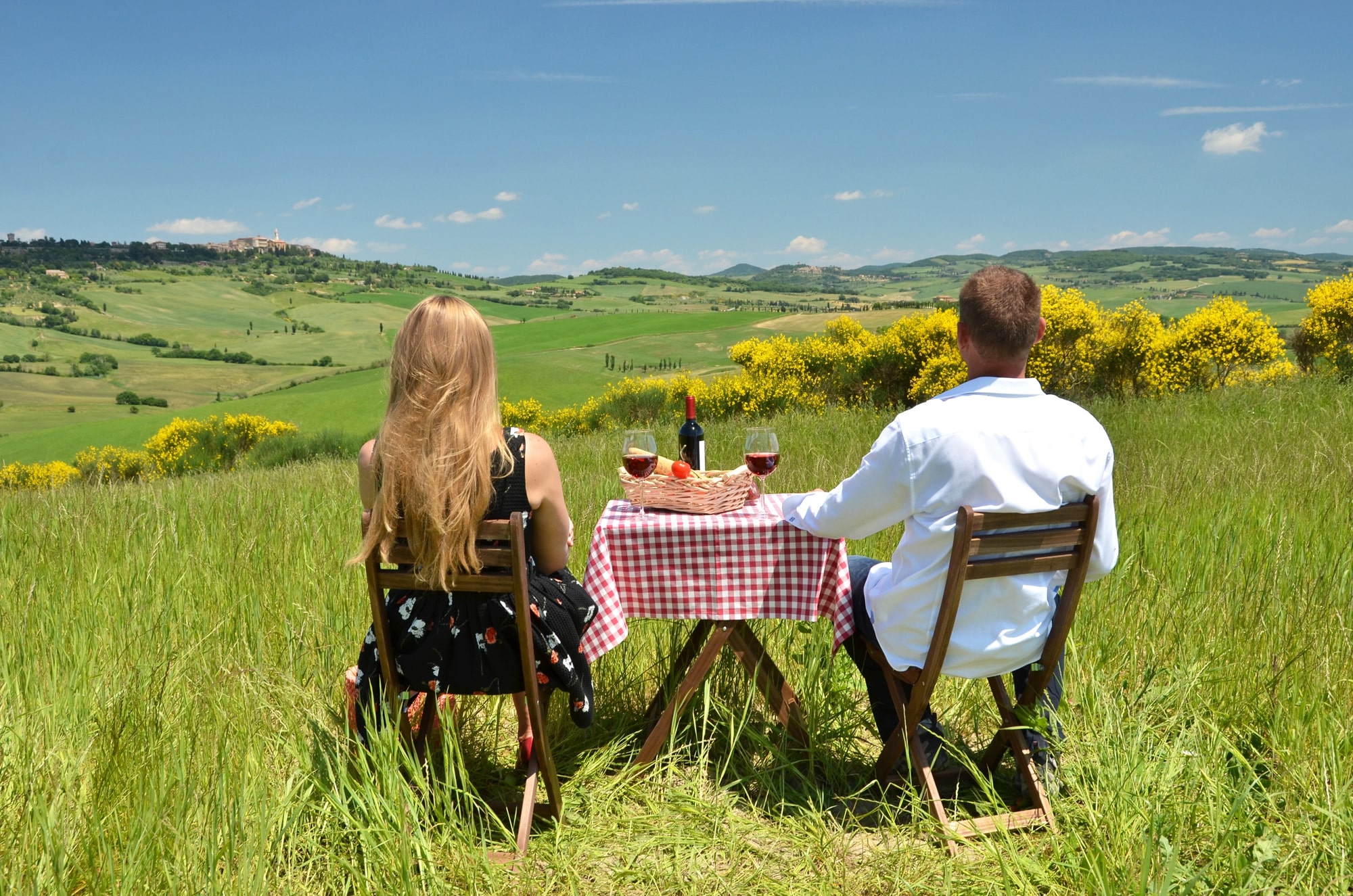 Couples in Tuscan countryside